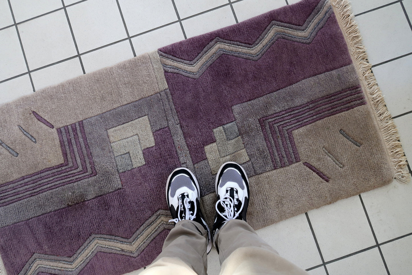 Handmade vintage Tibetan Khaden rug in geometric design. The rug has been made in wool in the end of 20th century. It is in original good condition.
