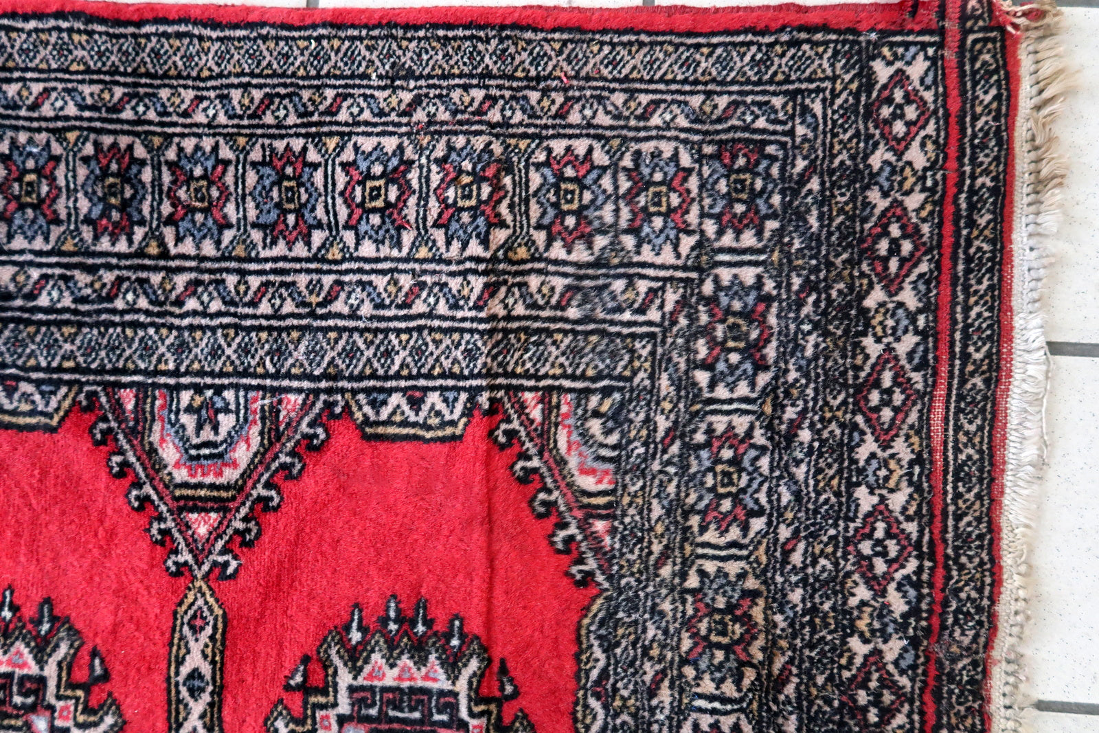 Handmade vintage Uzbek Bukhara rug 1970s