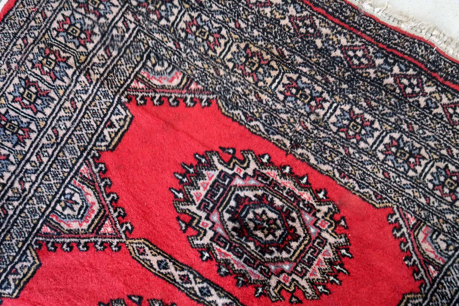 Handmade vintage Uzbek Bukhara rug 1970s