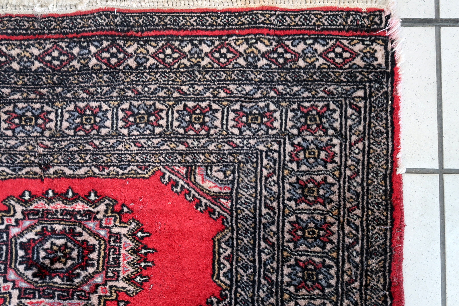 Handmade vintage Uzbek Bukhara rug 1970s