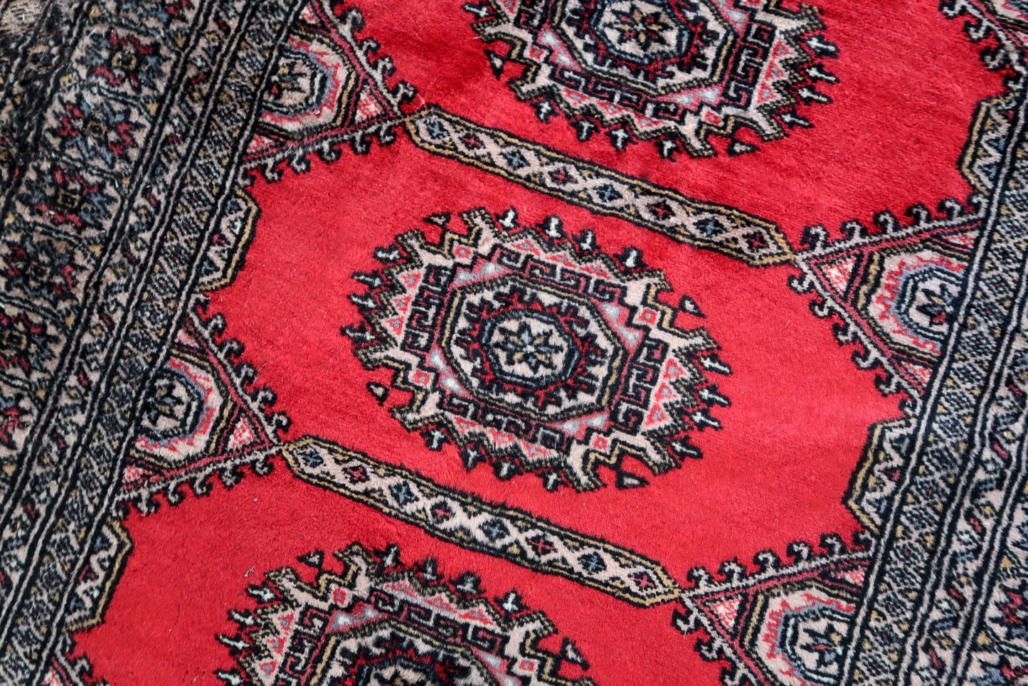 Handmade vintage Uzbek Bukhara rug 1970s
