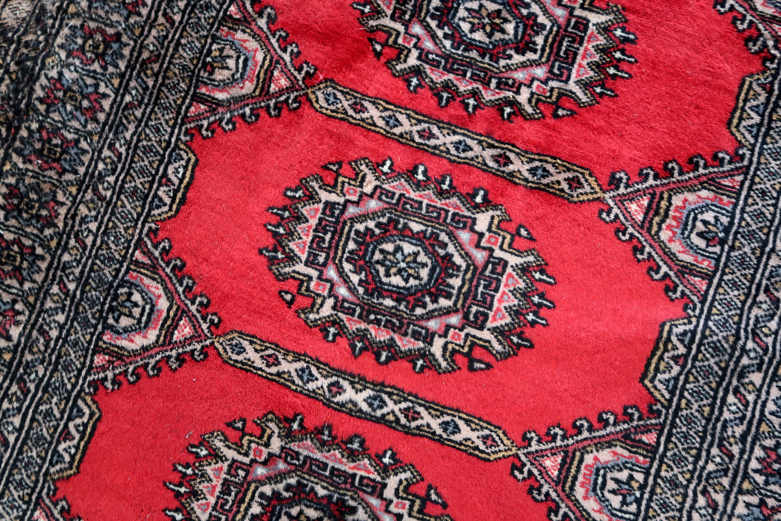 Handmade vintage Uzbek Bukhara rug 1970s
