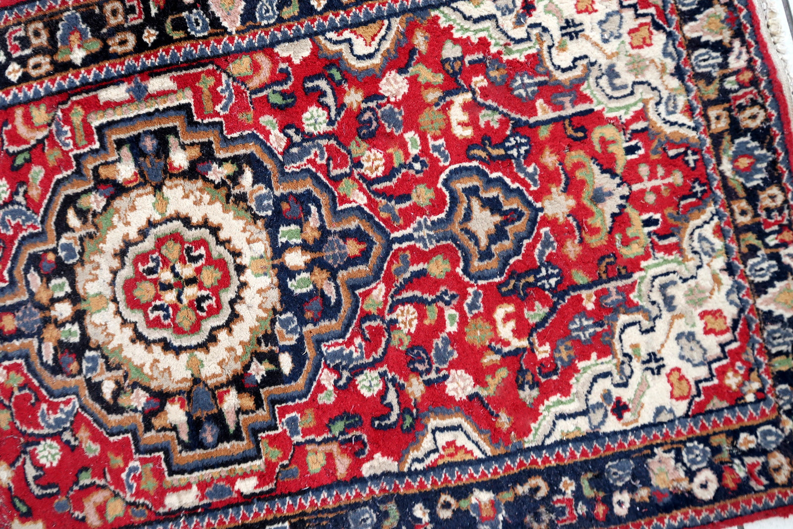 Handmade vintage Persian Malayer runner in red color. The rug has been made in wool in the middle of 20th century. It is in original condition, it has some signs of age.