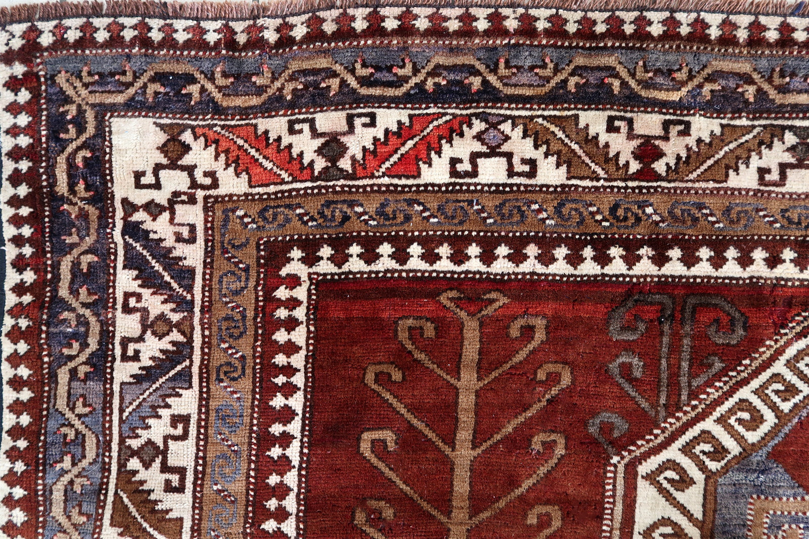 Handmade vintage Caucasian Kazak rug 1940s