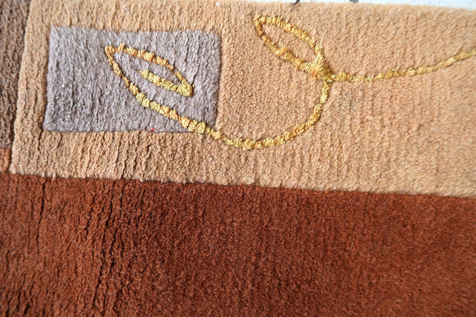 Handmade vintage Tibetan Khaden rug in different shades of brown and beige colors. The rug is from the end of 20th century, it is in original good condition. 