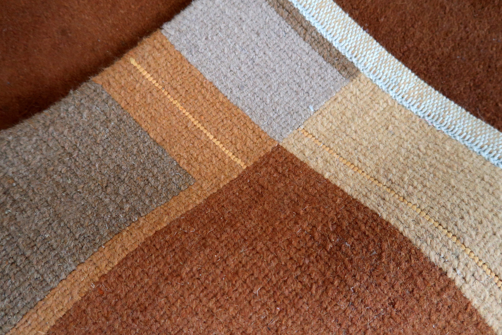 Handmade vintage Tibetan Khaden rug in different shades of brown and beige colors. The rug is from the end of 20th century, it is in original good condition. 