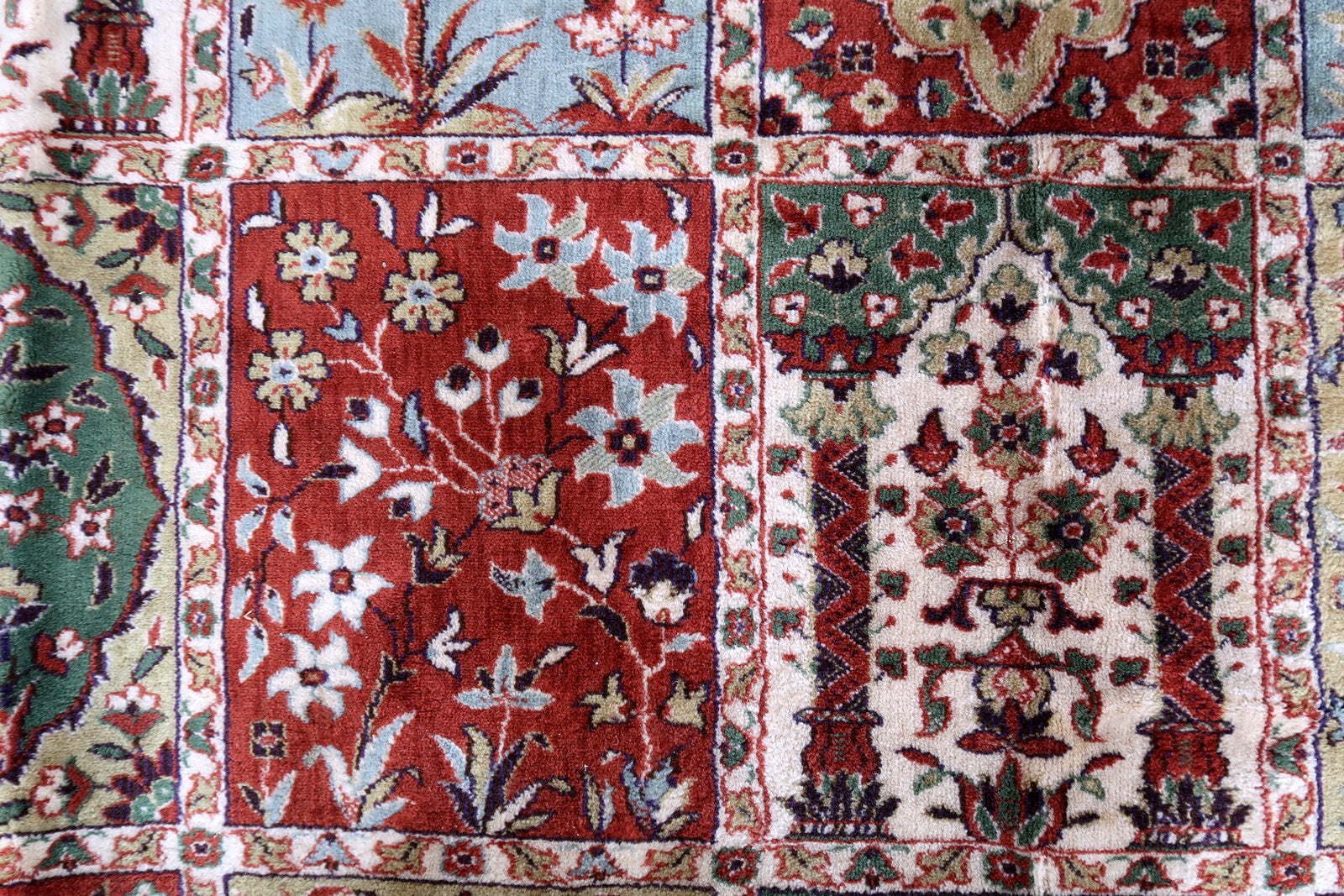 Vintage Indian rug with Qum garden design. This rug is from the end of 20th century in original good condition. 