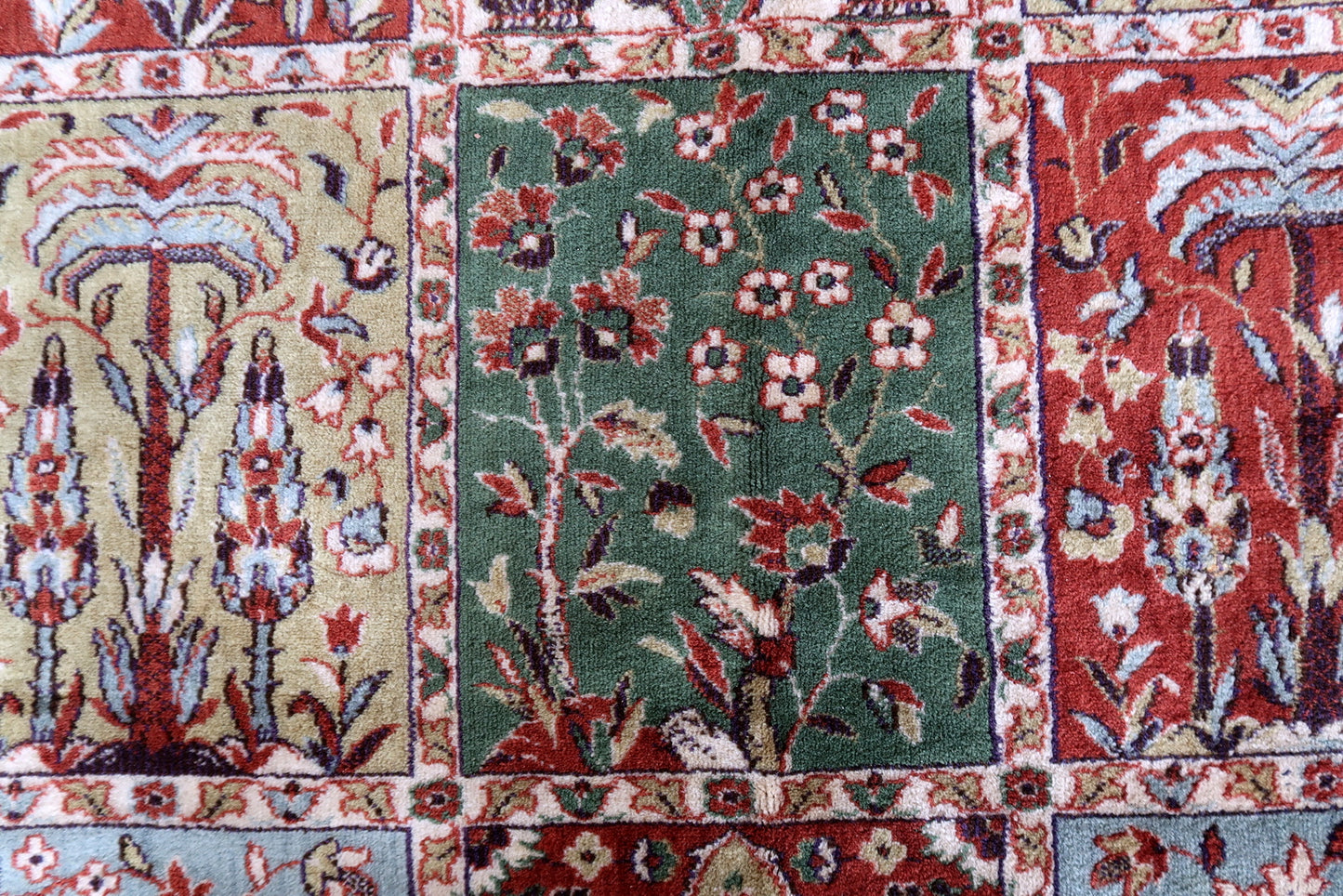 Vintage Indian rug with Qum garden design. This rug is from the end of 20th century in original good condition. 