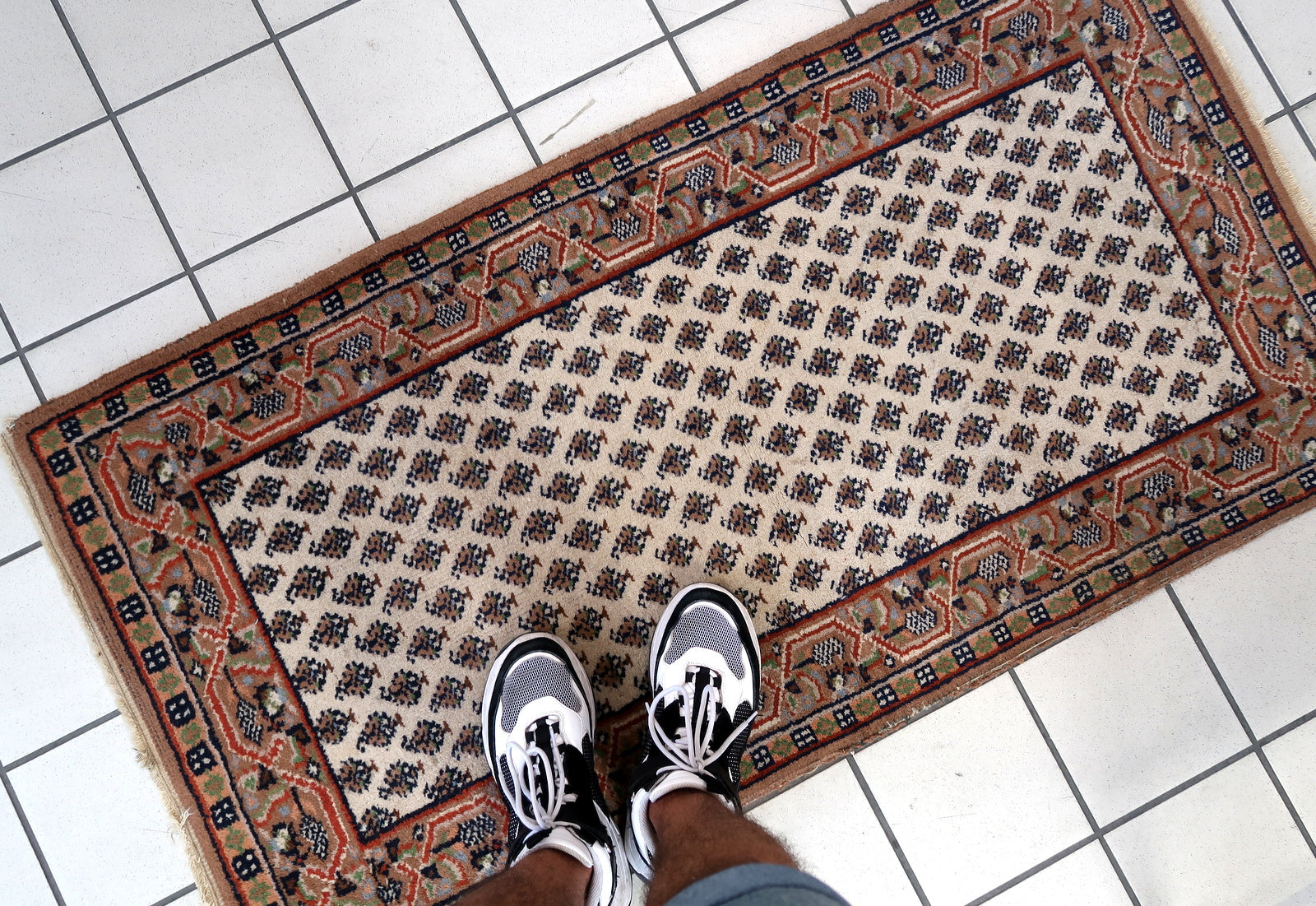 Handmade vintage Indian Seraband rug in white color and all-over design. The rug has been made in the end of 20th century. It is in original good condition.
