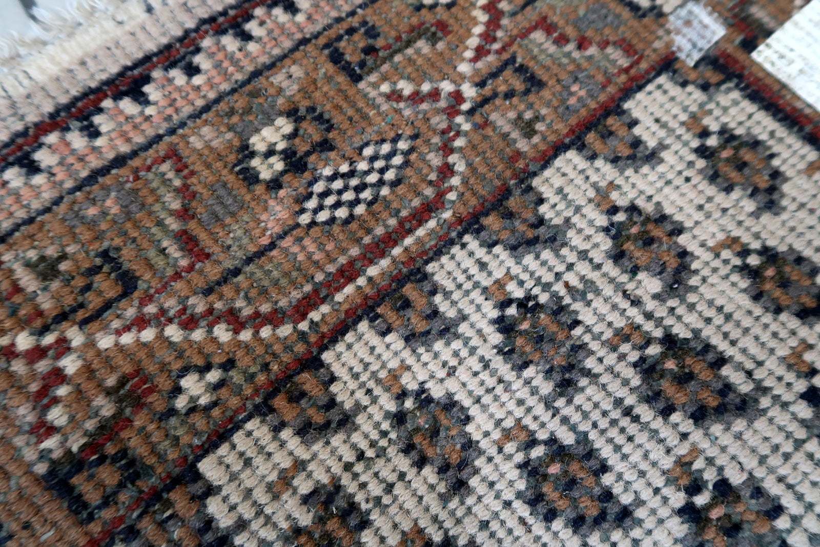 Handmade vintage Indian Seraband rug in white color and all-over design. The rug has been made in the end of 20th century. It is in original good condition.