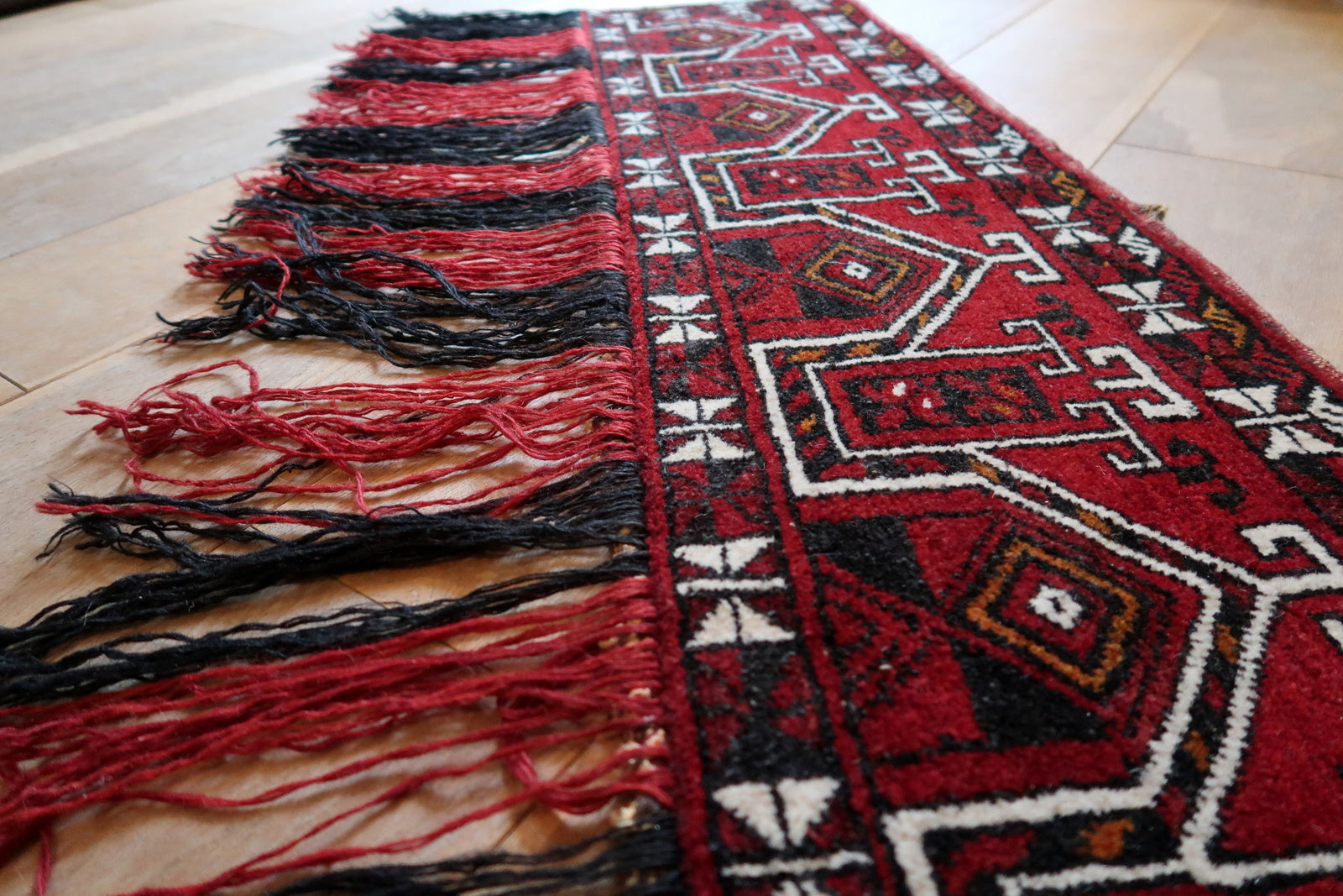 Handmade vintage Turkmen Beshir Torba rug in bright red color. The rug is from the end of 20th century in original good condition.