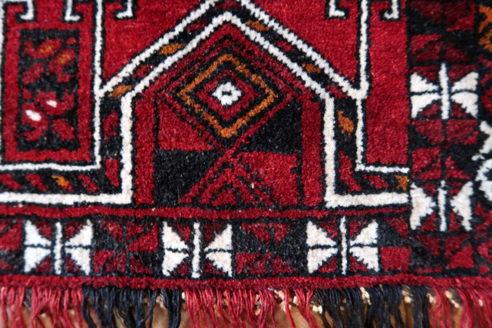 Handmade vintage Turkmen Beshir Torba rug in bright red color. The rug is from the end of 20th century in original good condition.