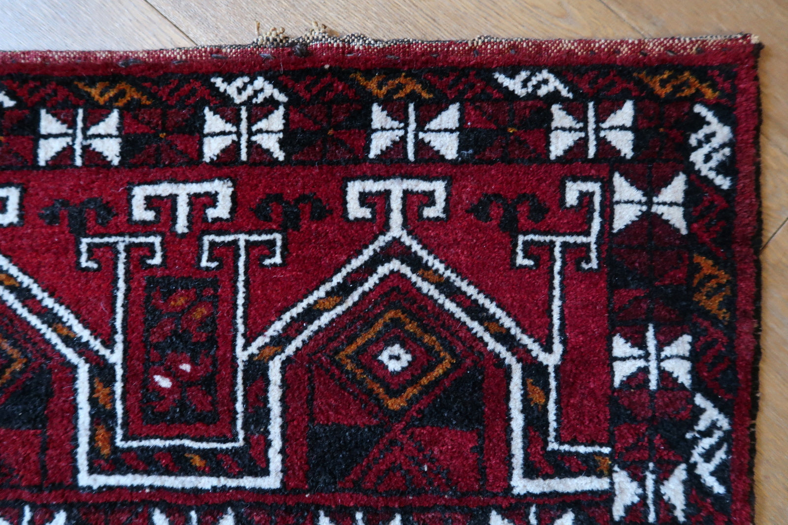 Handmade vintage Turkmen Beshir Torba rug in bright red color. The rug is from the end of 20th century in original good condition.