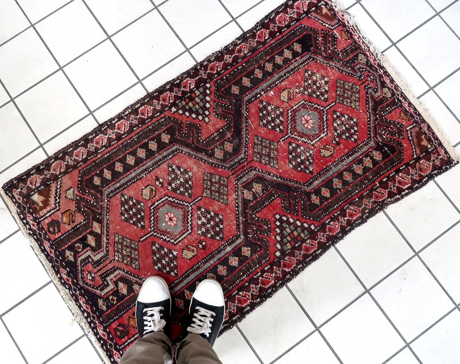 Handmade vintage Persian Hamadan rug in pale red and brown colors. The rug is from the middle of 20th century in original condition, it has some signs of age.