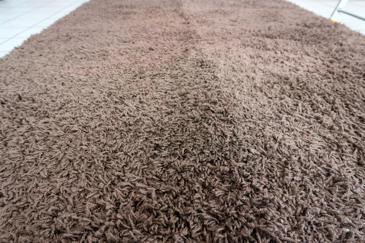 Vintage Swedish shag rug in chocolate brown color. The rug is from the end of 20th century in original good condition. It is machine made rug.
