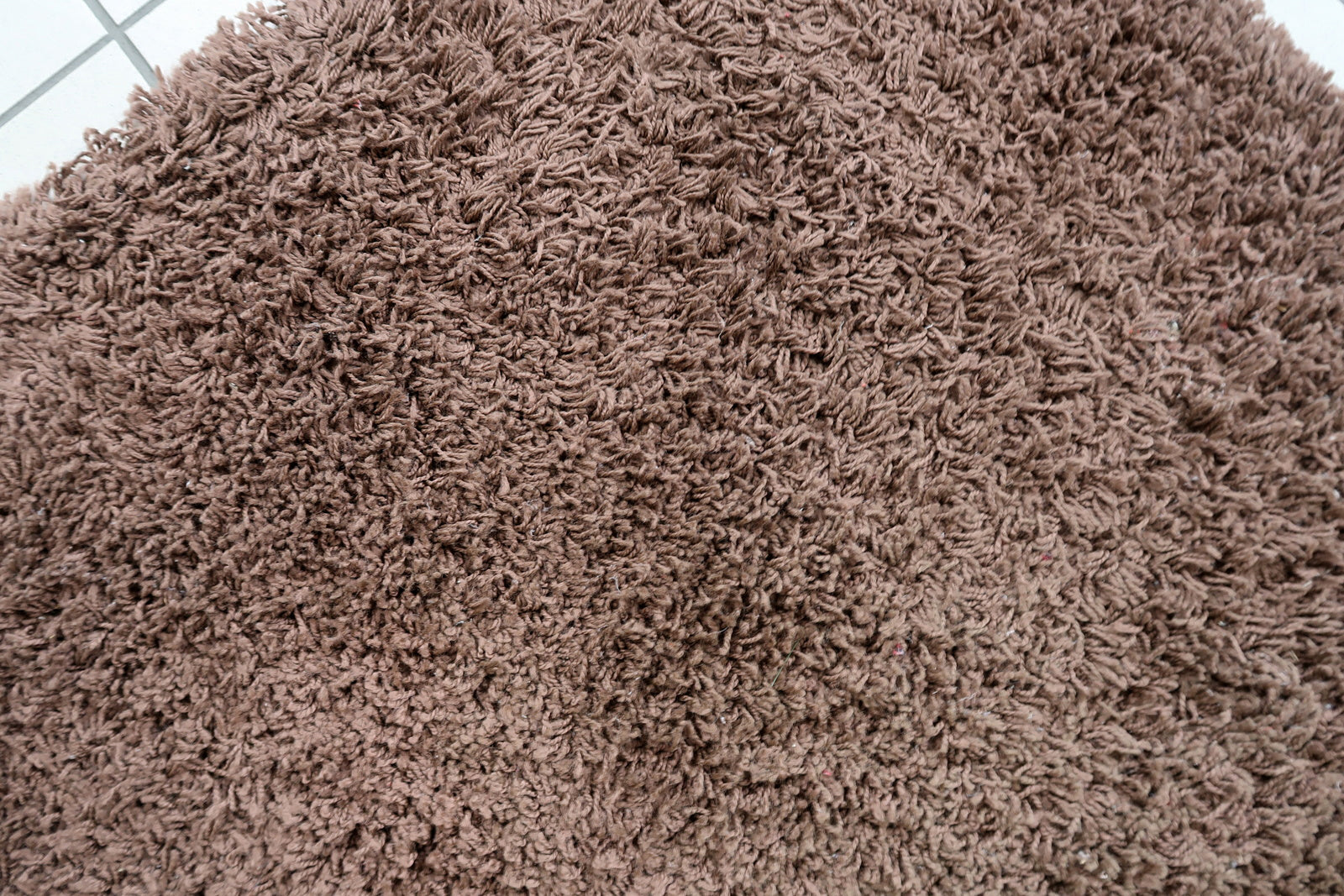 Vintage Swedish shag rug in chocolate brown color. The rug is from the end of 20th century in original good condition. It is machine made rug.