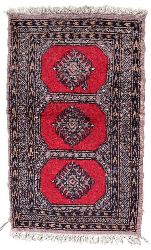 Handmade vintage Uzbek Bukhara rug 1970s