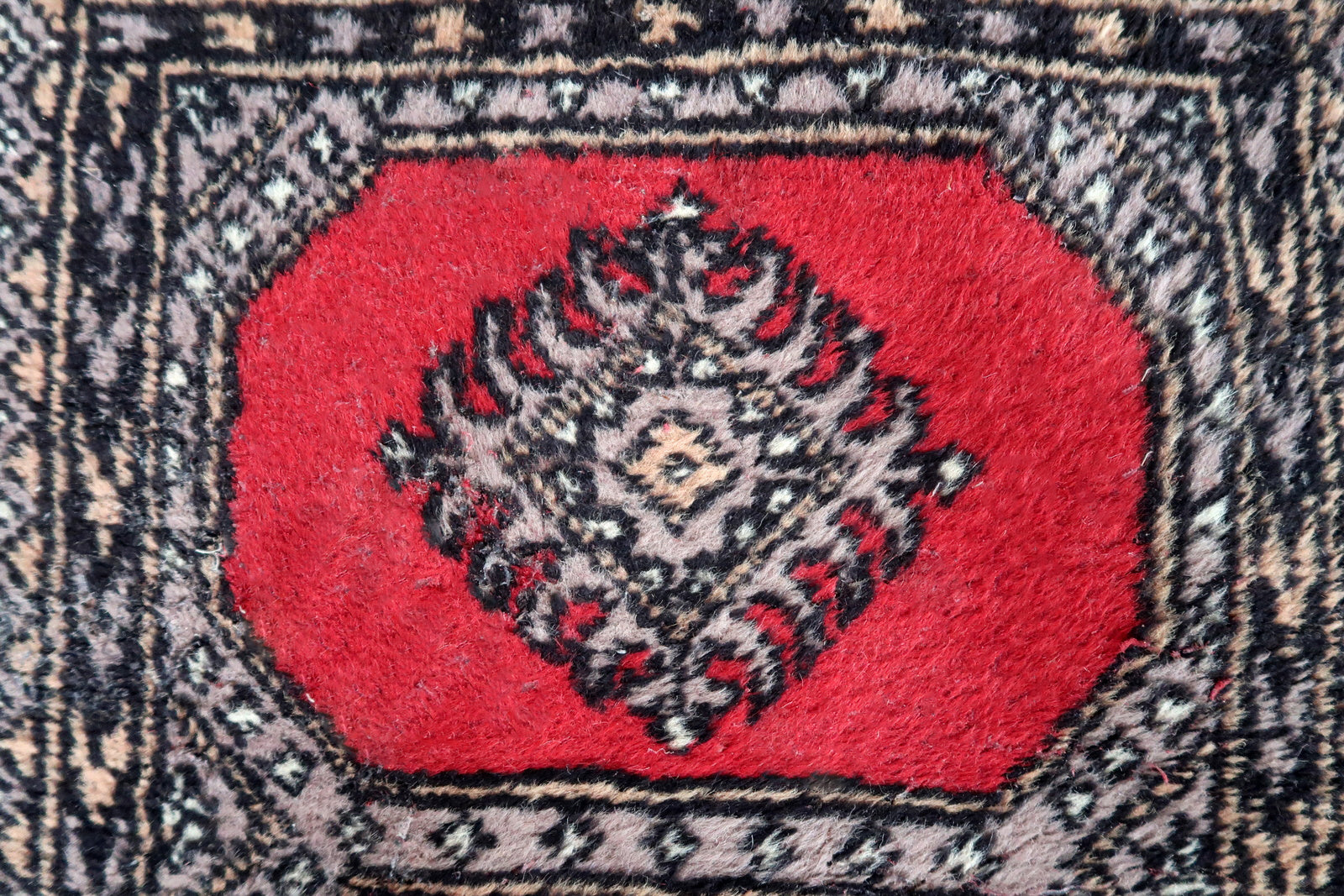 Handmade vintage Uzbek Bukhara rug 1970s