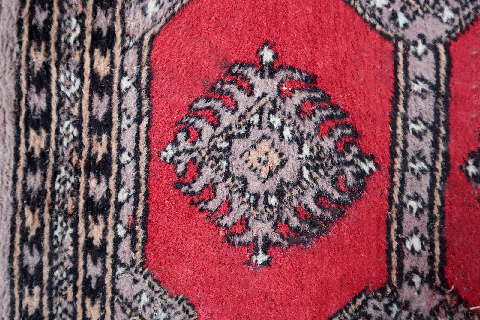 Handmade vintage Uzbek Bukhara rug 1970s