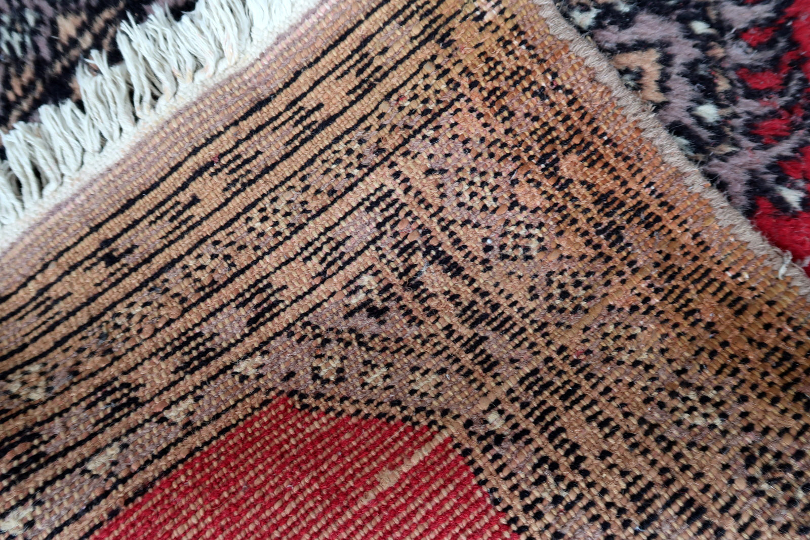 Handmade vintage Uzbek Bukhara rug in traditional design. The rug is from the end of 20th century, it is in original condition, has some signs of age.