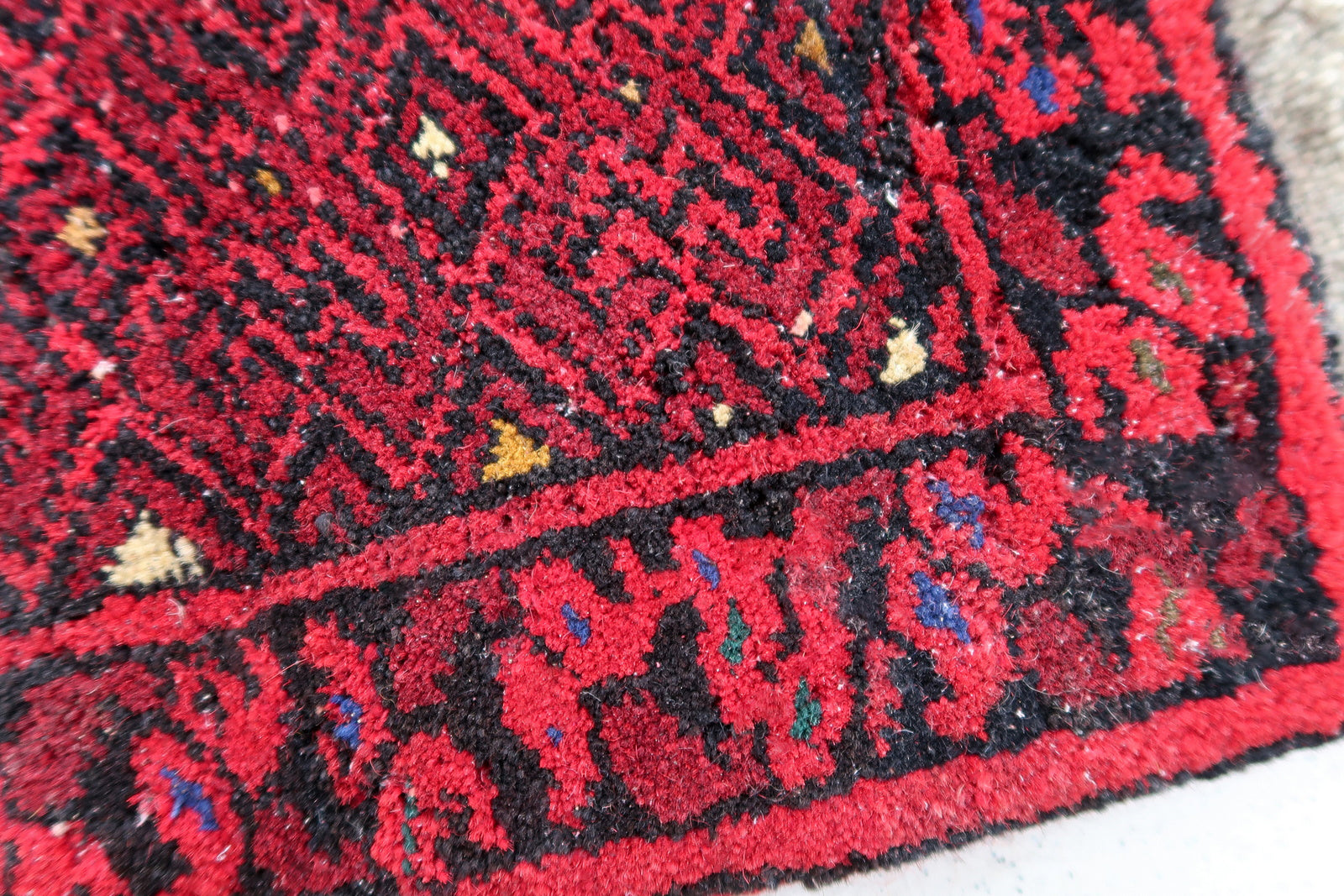 Handmade vintage Afghan Ersari mat in bright red shade. The rug is from the end of 20th century in original good condition. It can be used as a doll house rug.