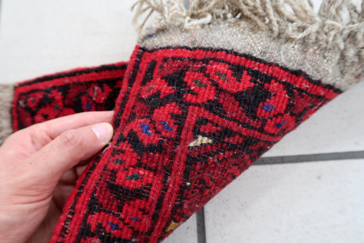 Handmade vintage Afghan Ersari mat in bright red shade. The rug is from the end of 20th century in original good condition. It can be used as a doll house rug.