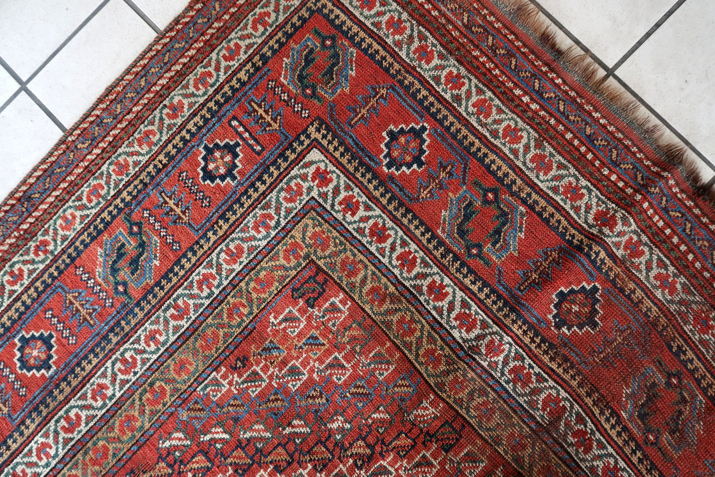 Handmade antique Persian Khamseh distressed rug 1880s