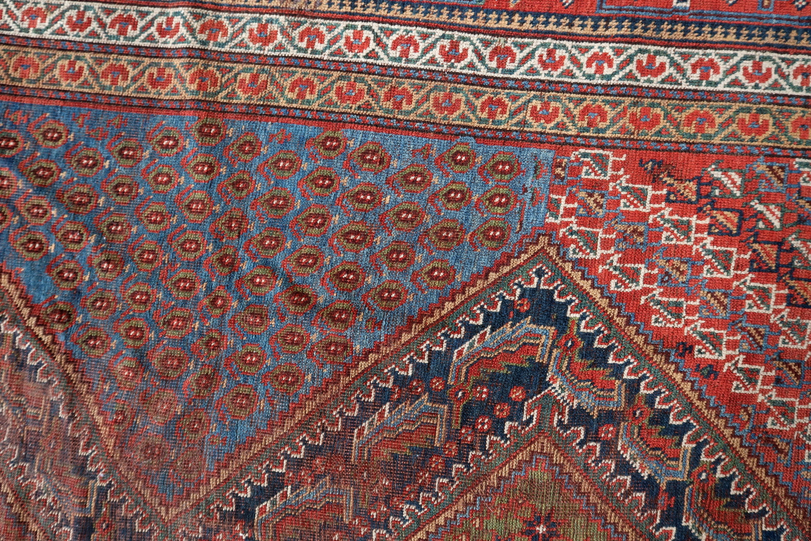Handmade antique Persian Khamseh distressed rug 1880s
