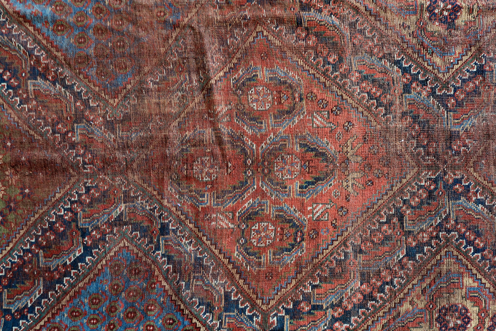 Handmade antique Persian Khamseh distressed rug 1880s