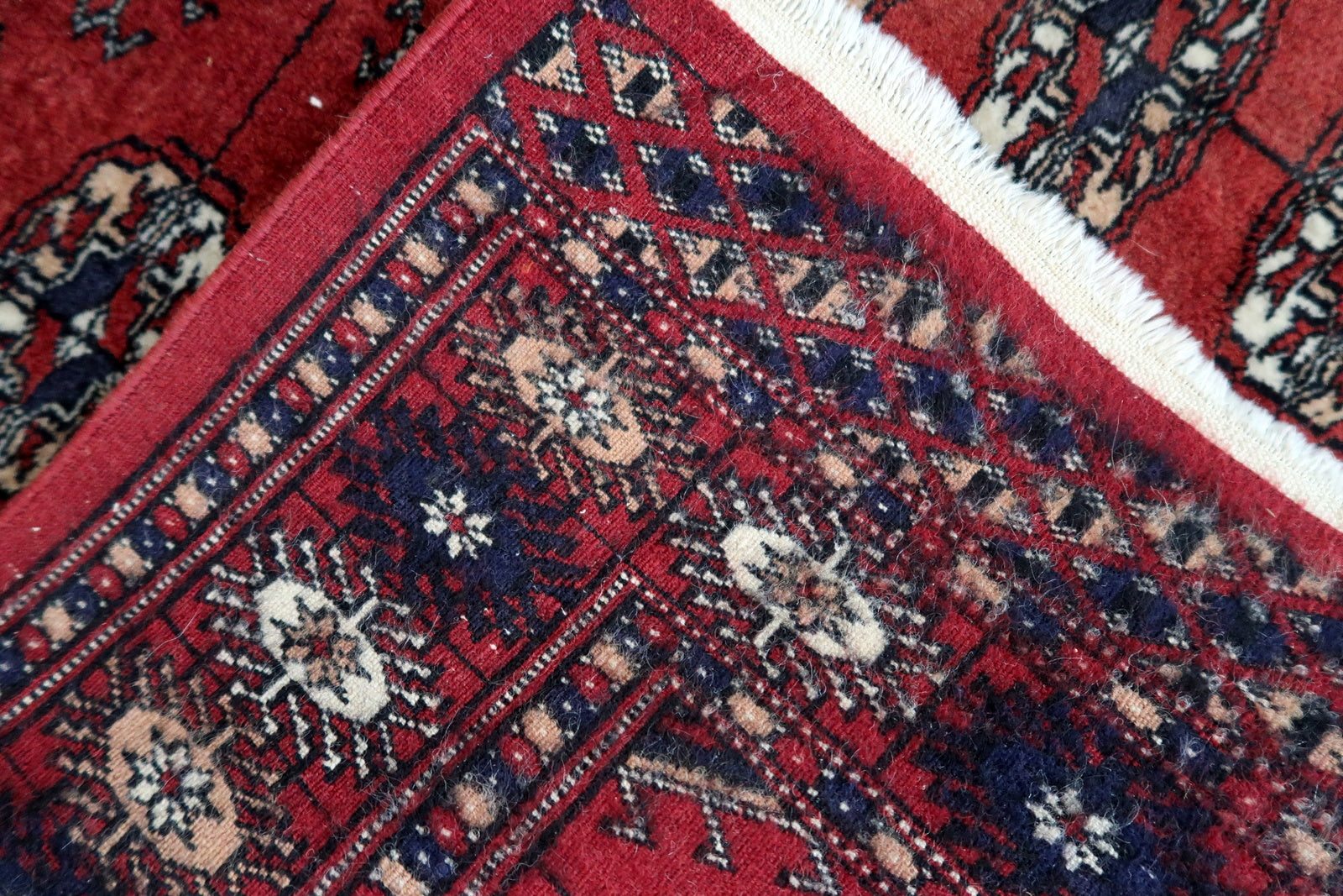 Handmade vintage Uzbek Bukhara rug 1970s