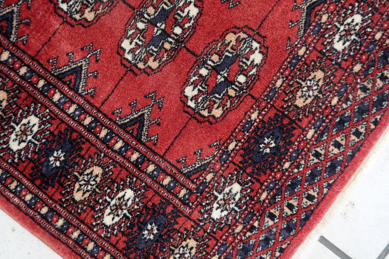 Handmade vintage Uzbek Bukhara rug 1970s