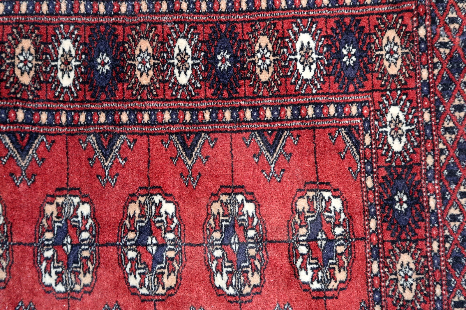 Handmade vintage Uzbek Bukhara rug 1970s