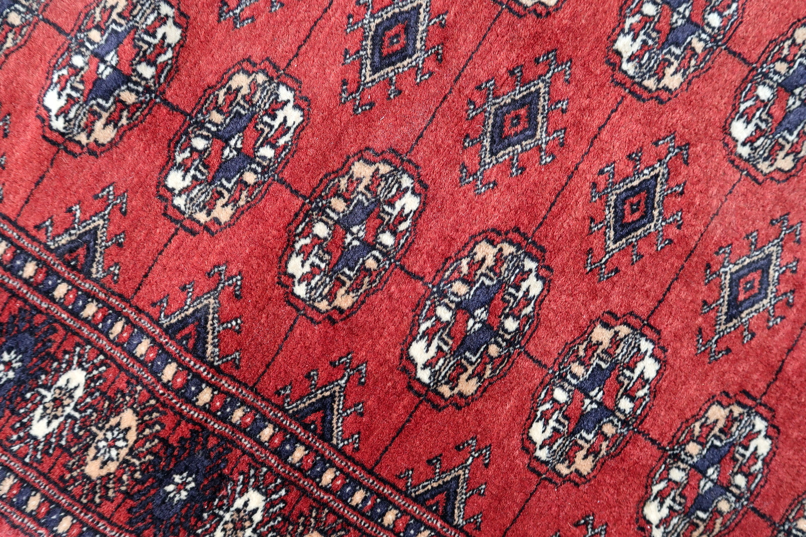 Handmade vintage Uzbek Bukhara rug 1970s