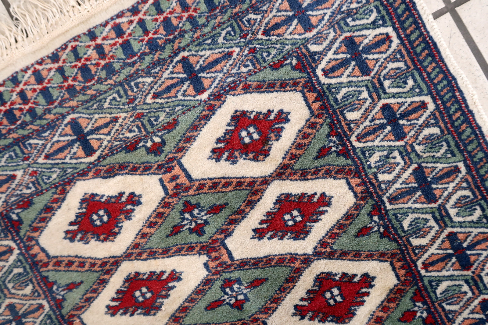 Handmade vintage Uzbek Bukhara rug 1970s