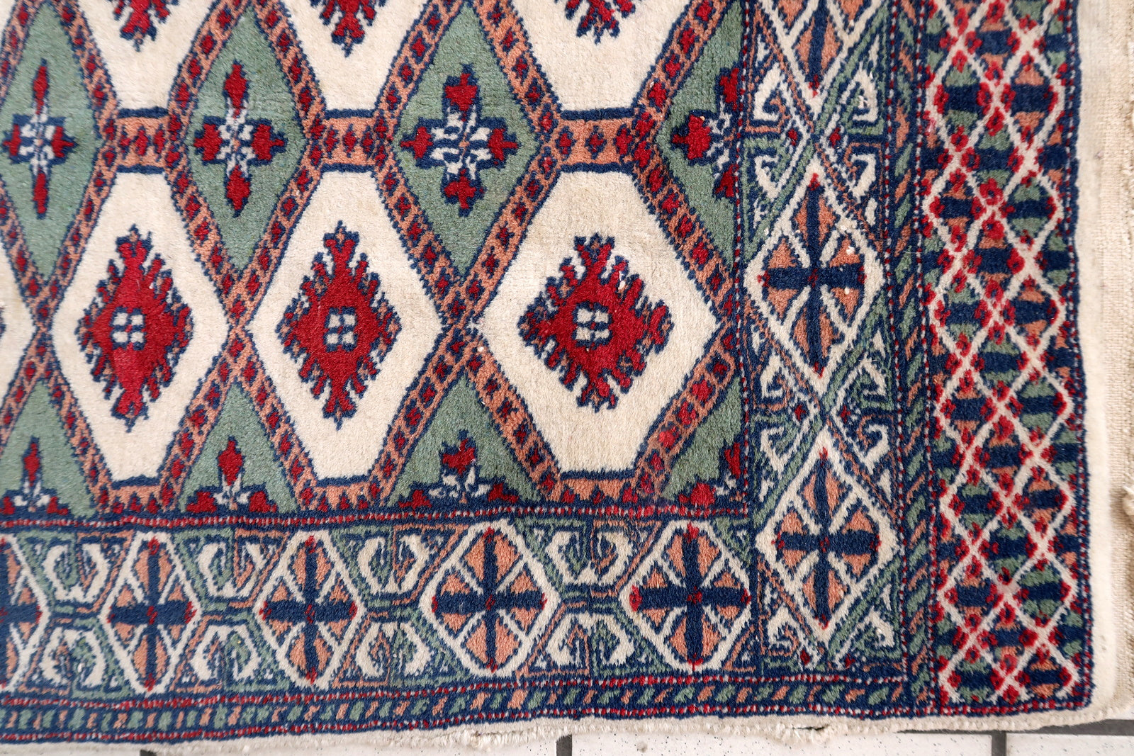 Handmade vintage Uzbek Bukhara rug 1970s