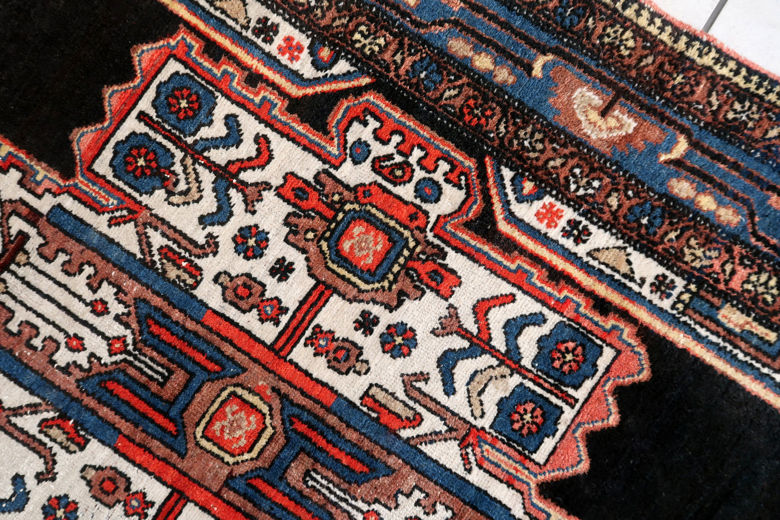 Handmade antique Persian Malayer rug in black and white colors. The rug is from the beginning of 20th century in original condition, it has some low pile.