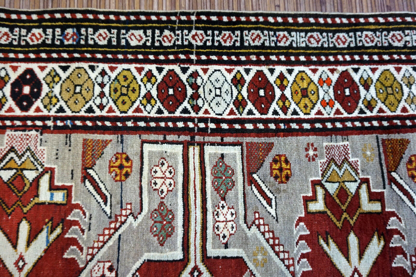Handmade vintage Caucasian Shirvan rug in unusual cross design. The rug is from the middle of 20th century in original good condition.