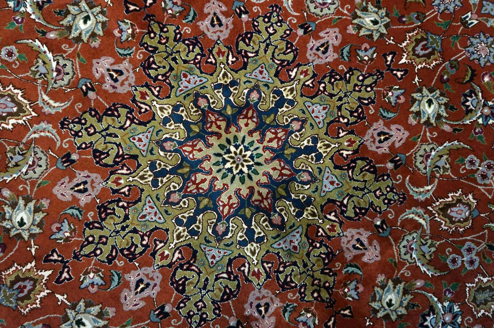 Handmade vintage Persian Tabriz square rug in classic floral design. The rug is fro;m the end of 20th century in original good condition. 