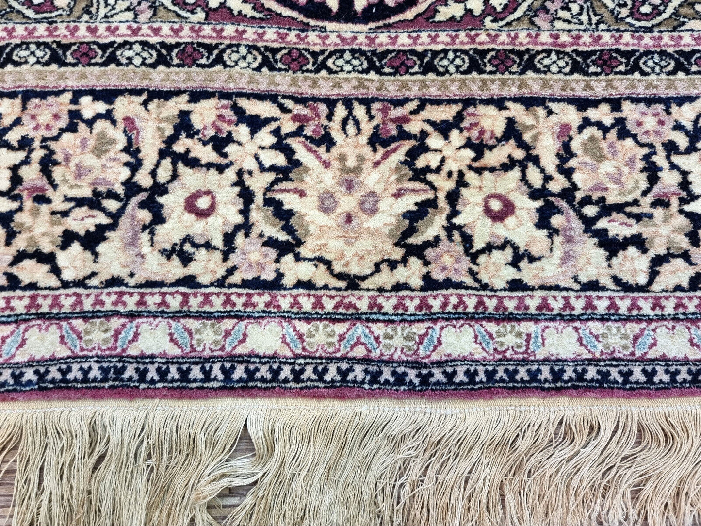 Handmade antiaue Persian Isfahan rug in traditional floral design with large medalllioin. The rug is from the beginning of 20th century in original good condition. It is made in wool.