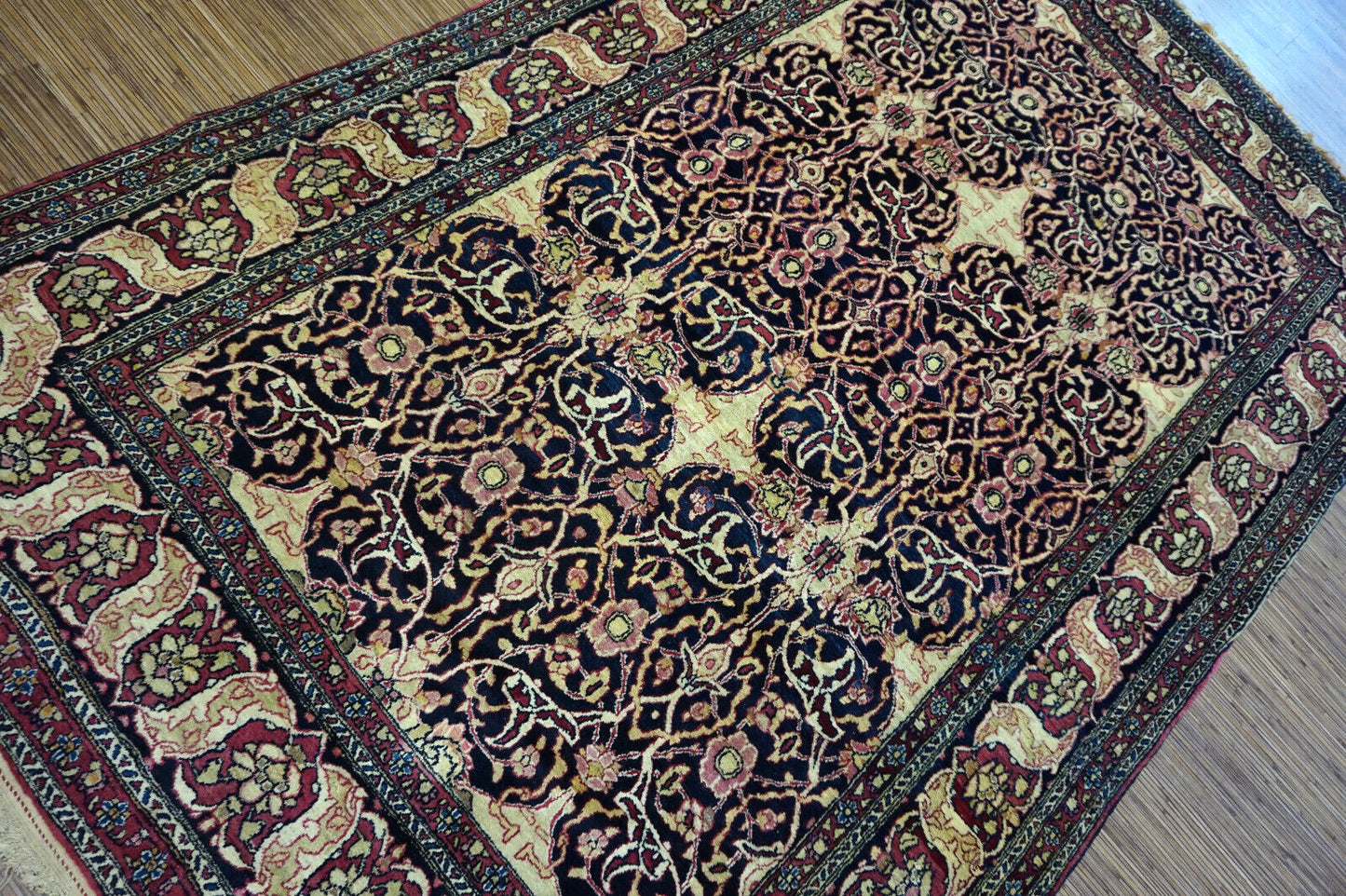 Handmade antique Persian Isfahan rug 1900s