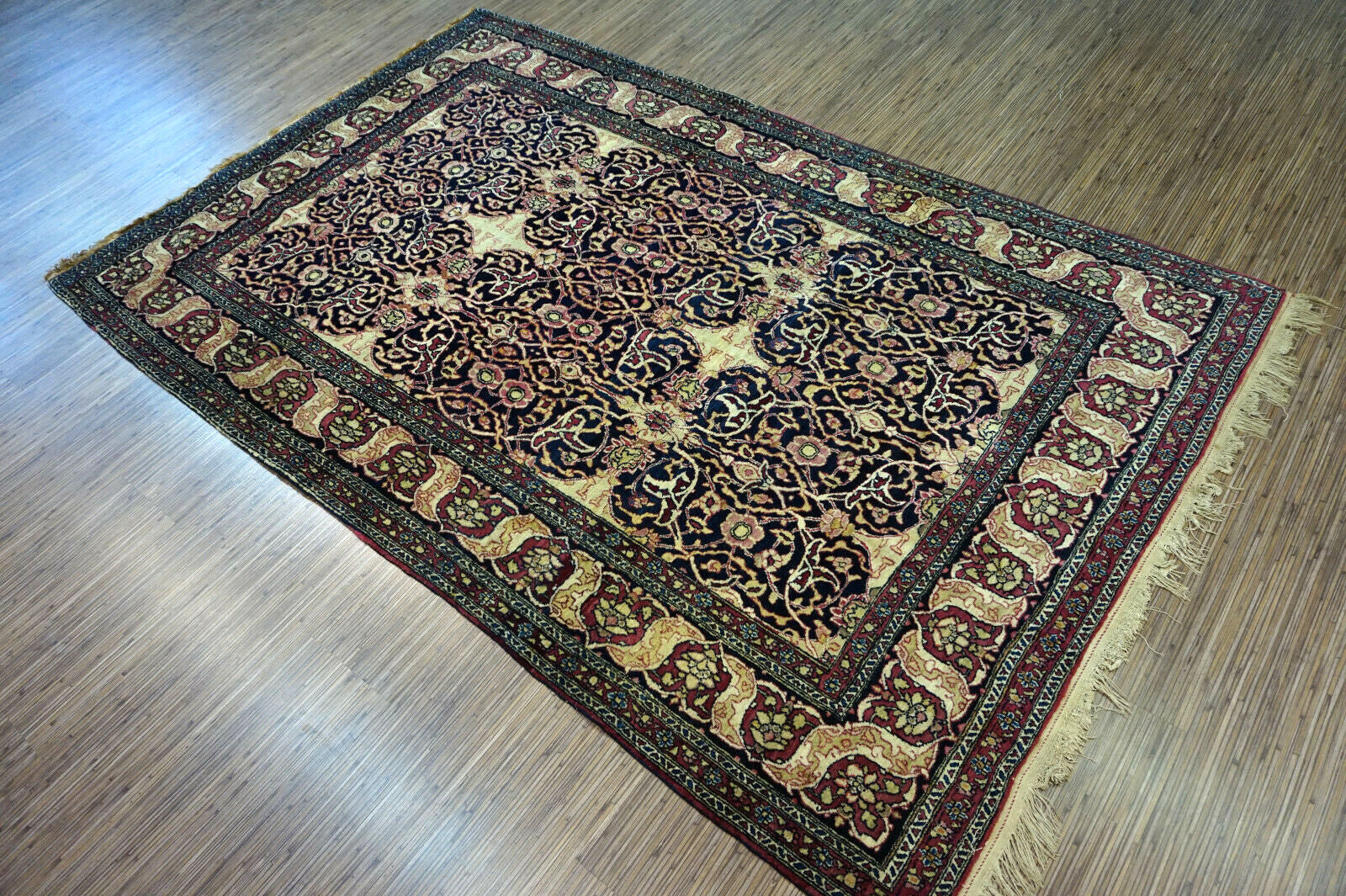 Handmade antique Persian Isfahan rug 1900s