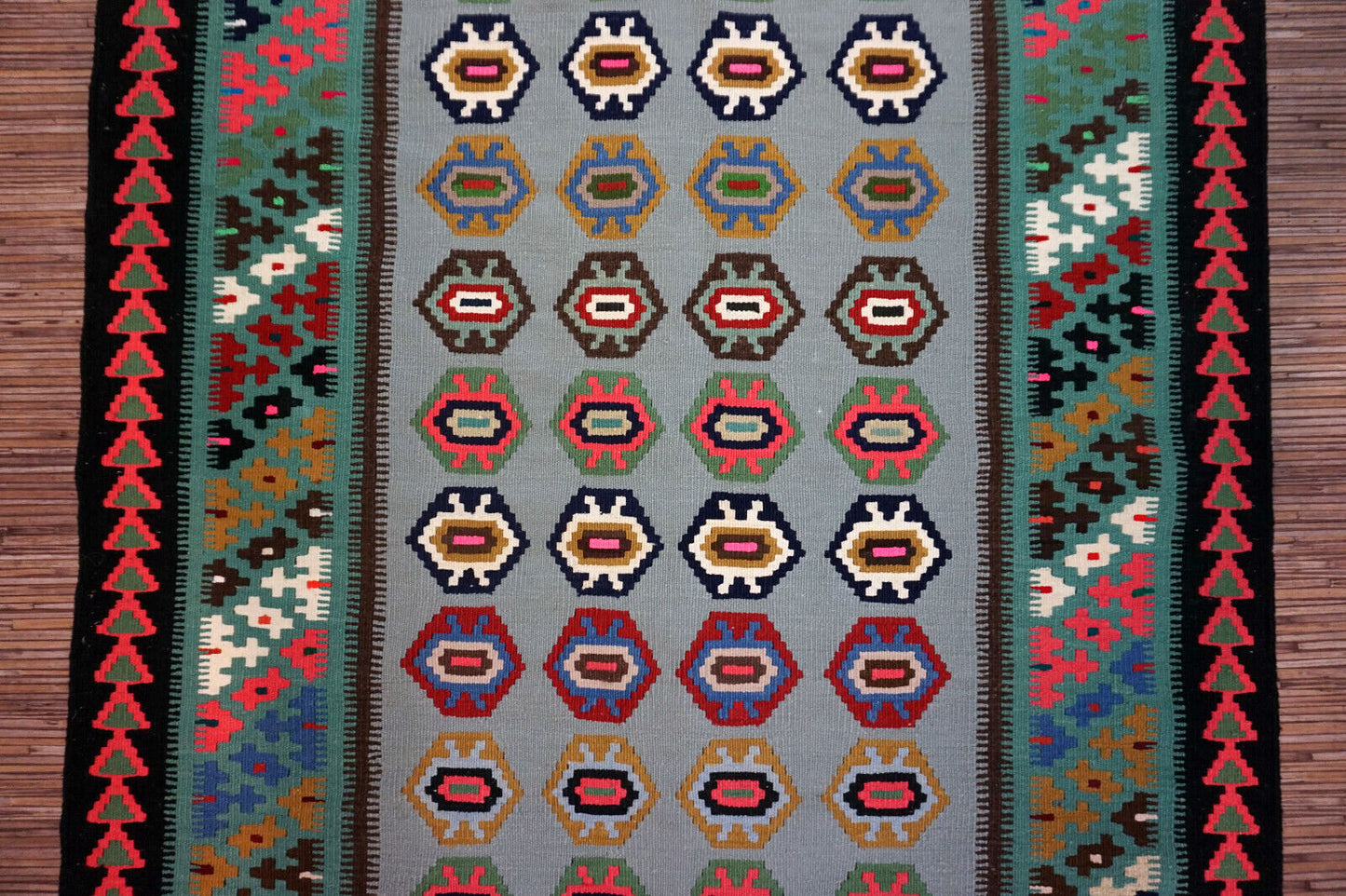 Handmade vintage Afghan Ardabil runner in repeating design and pastel shades. This rtug is from the middle of 20th century in original good condition.