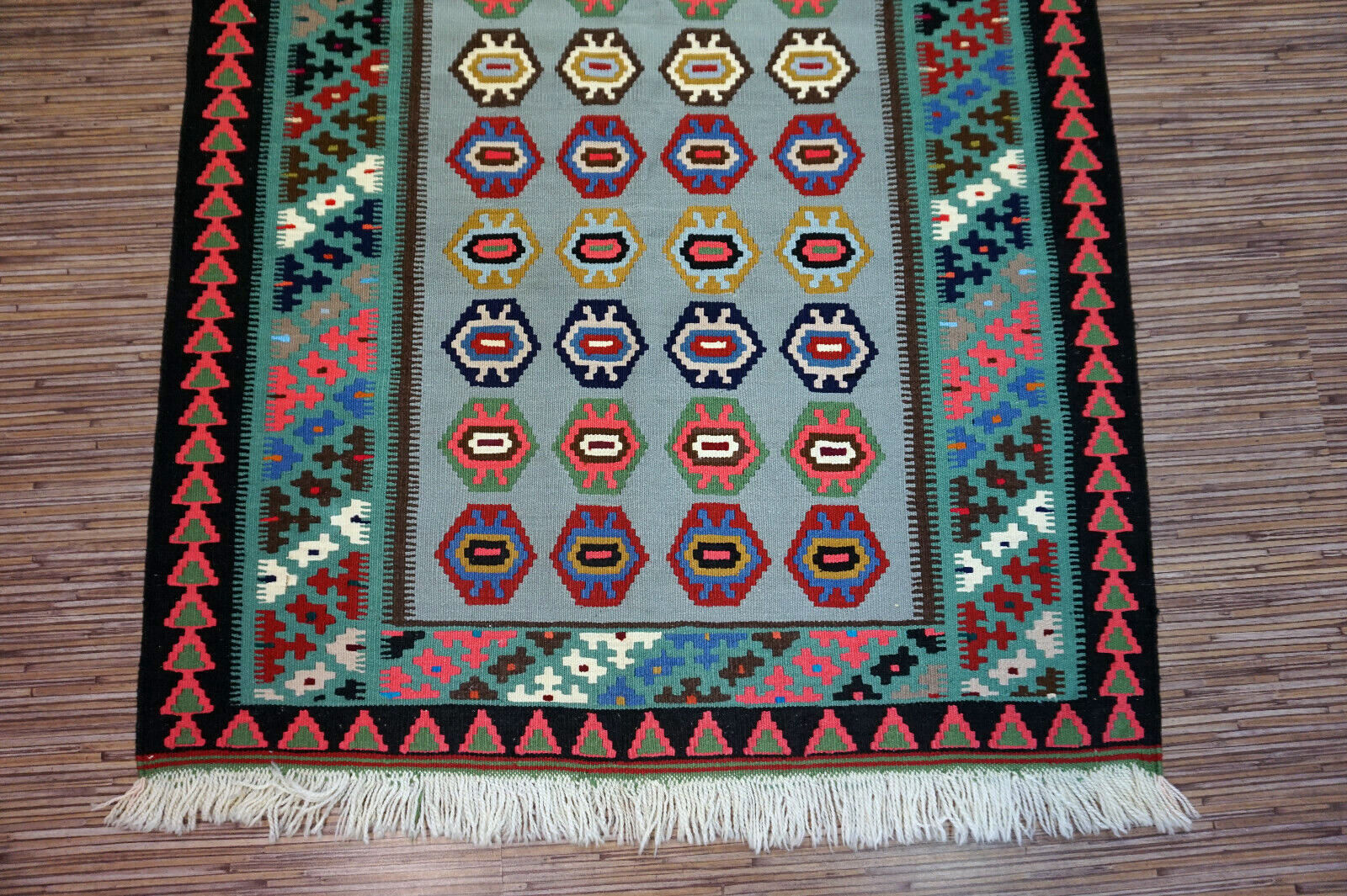 Handmade vintage Afghan Ardabil runner in repeating design and pastel shades. This rtug is from the middle of 20th century in original good condition.