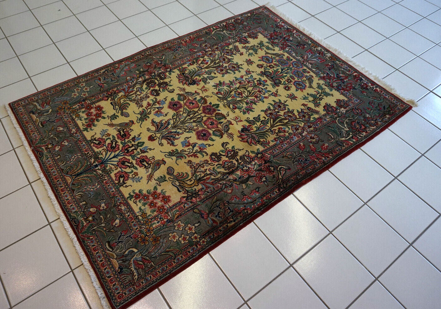Handmade vintage Persian Qum rug in egg shell and grey shades with birds design.