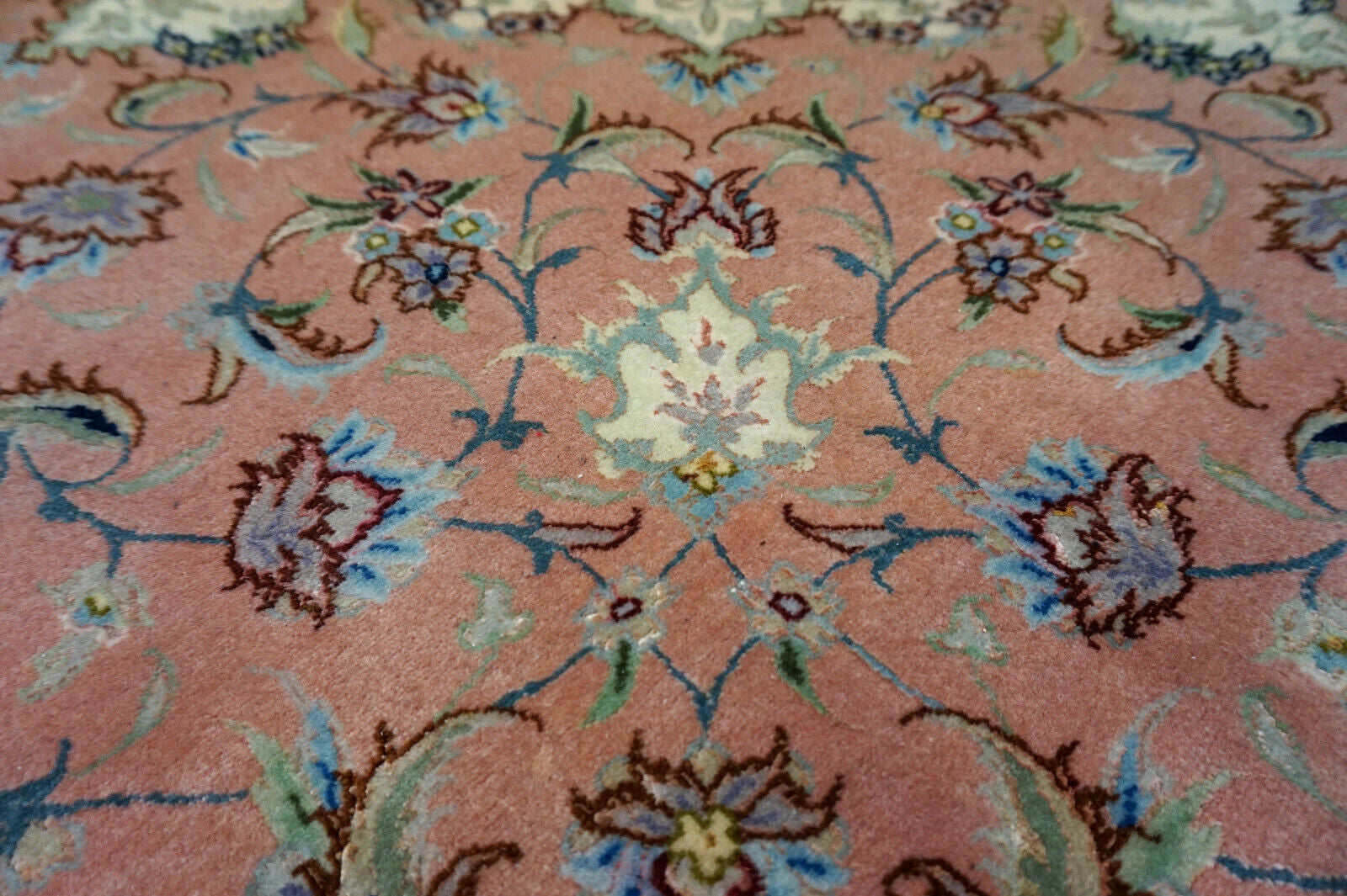 Beige, Pink, and Turquoise Details on Wool Rug