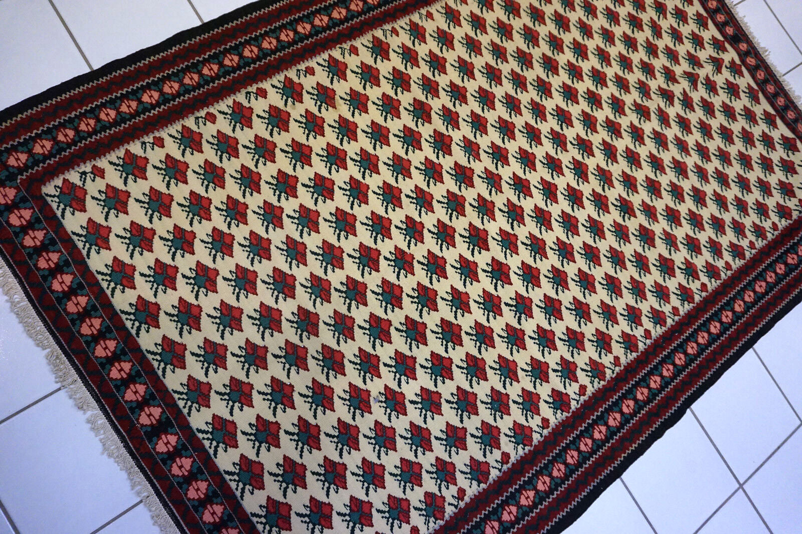 Vintage Persian kilim rug with beautiful color combinations and geometric shapes