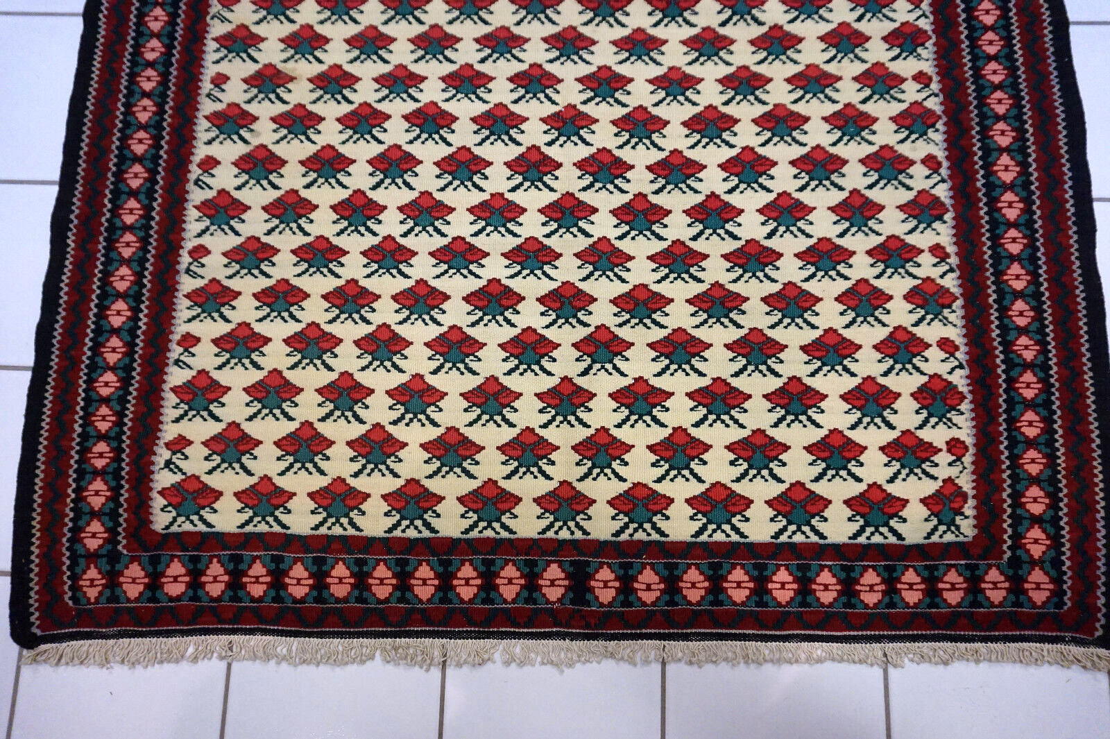 Antique wool rug with unique handmade craftsmanship from the Middle East