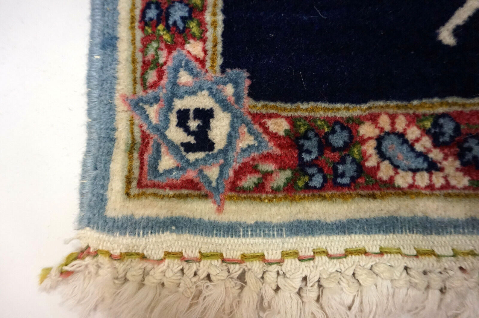 Detailed View of Rug's Edges and Fringes