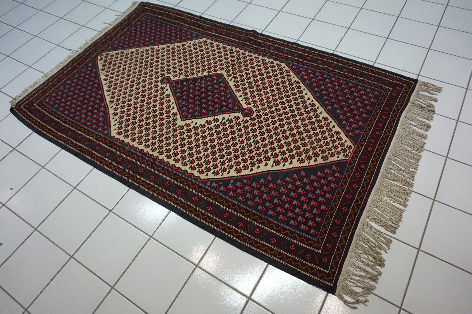 Handmade Middle Eastern rug with Senneh style design