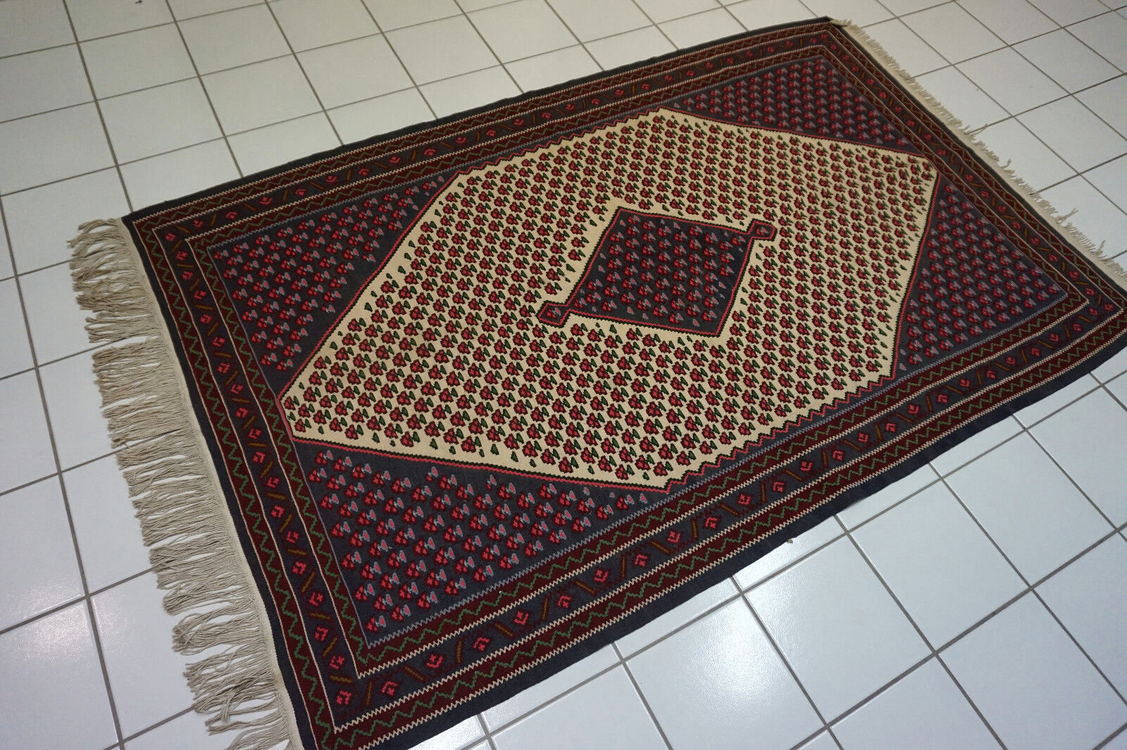 Vintage Persian carpet in original good condition